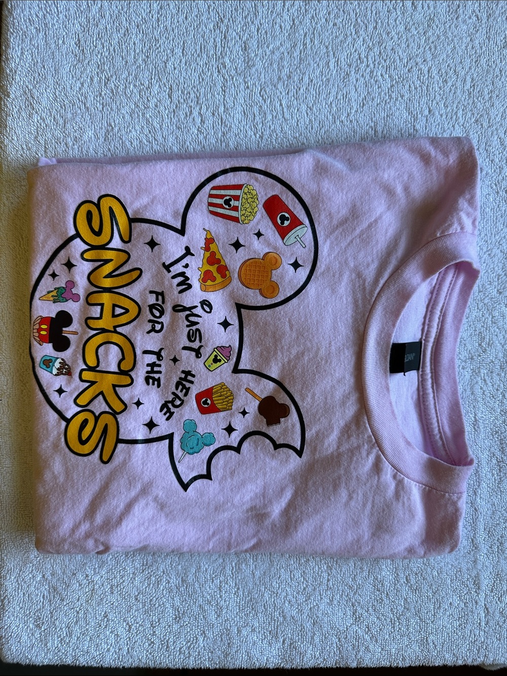 Girls light pink  Disney here for the snacks shirt